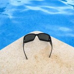 sunglasses by pool